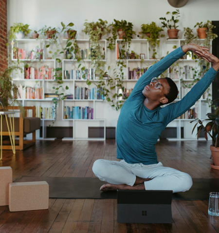 A person doing yoga in a room.
