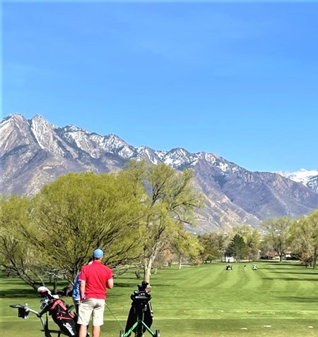 A person playing golf.